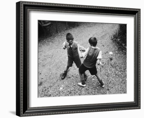 Put 'Em Up!' Two Boys Enjoy a Game of Fisticuffs in a Garden or Playground-null-Framed Photographic Print
