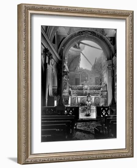 Pvt. Paul Oglesby, 30th Infantry, Standing in Reverence Before Altar in Damaged Catholic Church-Benson-Framed Photographic Print