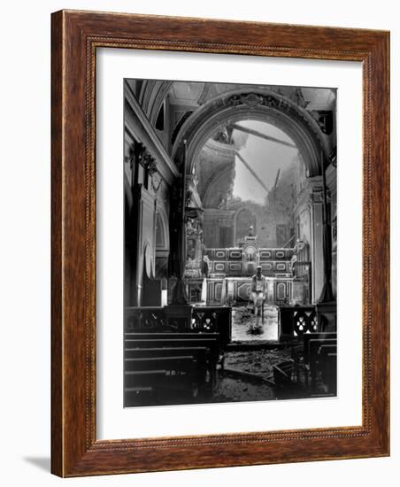 Pvt. Paul Oglesby, 30th Infantry, Standing in Reverence Before Altar in Damaged Catholic Church-Benson-Framed Photographic Print