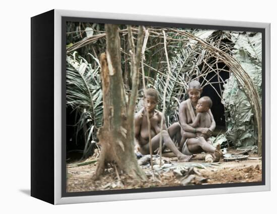Pygmy Women and Children Outside Huts, Central African Republic, Africa-Ian Griffiths-Framed Premier Image Canvas