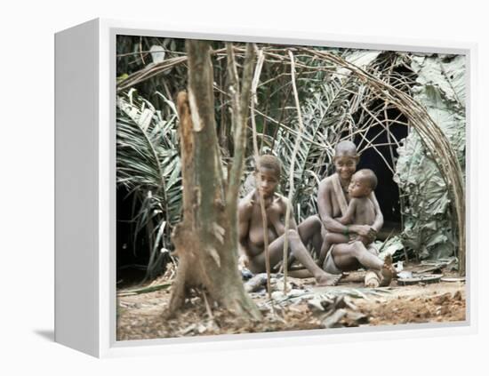 Pygmy Women and Children Outside Huts, Central African Republic, Africa-Ian Griffiths-Framed Premier Image Canvas