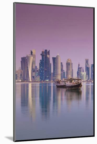 Qatar, Doha, Dhows on Doha Bay with West Bay Skyscrapers, Dawn-Walter Bibikow-Mounted Photographic Print