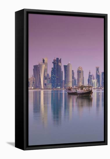 Qatar, Doha, Dhows on Doha Bay with West Bay Skyscrapers, Dawn-Walter Bibikow-Framed Premier Image Canvas