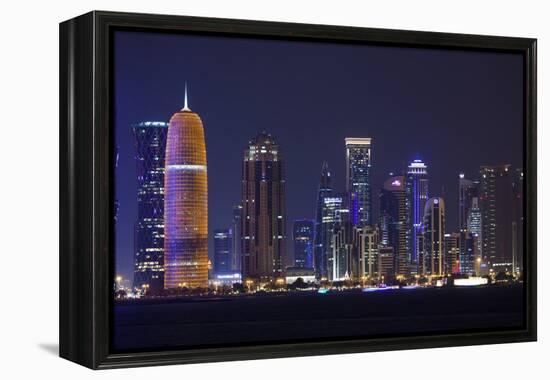 Qatar, Doha, Doha Bay, West Bay Skyscrapers, Dusk, with Burj Qatar Tower-Walter Bibikow-Framed Premier Image Canvas