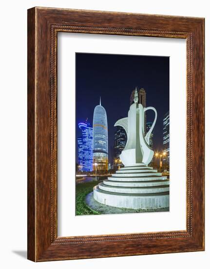 Qatar, Doha, Doha Bay, West Bay Skyscrapers, Dusk, with Large Coffeepot Sculpture-Walter Bibikow-Framed Photographic Print