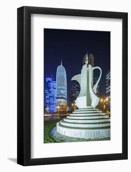 Qatar, Doha, Doha Bay, West Bay Skyscrapers, Dusk, with Large Coffeepot Sculpture-Walter Bibikow-Framed Photographic Print