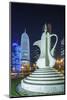 Qatar, Doha, Doha Bay, West Bay Skyscrapers, Dusk, with Large Coffeepot Sculpture-Walter Bibikow-Mounted Photographic Print