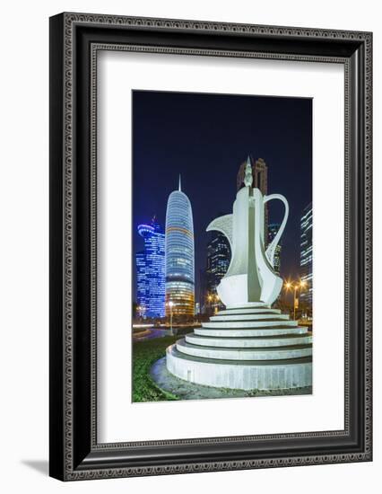 Qatar, Doha, Doha Bay, West Bay Skyscrapers, Dusk, with Large Coffeepot Sculpture-Walter Bibikow-Framed Photographic Print