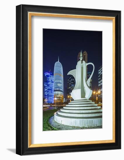 Qatar, Doha, Doha Bay, West Bay Skyscrapers, Dusk, with Large Coffeepot Sculpture-Walter Bibikow-Framed Photographic Print