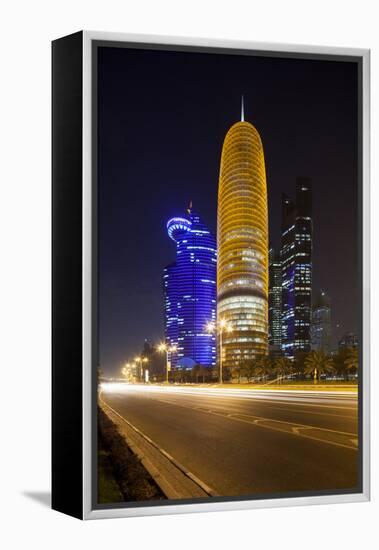 Qatar, Doha, Doha Bay, West Bay Skyscrapers Dusk, with World Trade Center , Gold-Walter Bibikow-Framed Premier Image Canvas