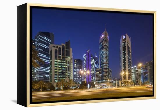 Qatar, Doha, Doha Bay, West Bay Skyscrapers, Dusk-Walter Bibikow-Framed Premier Image Canvas