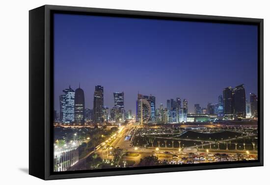 Qatar, Doha, Doha Bay, West Bay Skyscrapers, Elevated View, Dusk-Walter Bibikow-Framed Premier Image Canvas