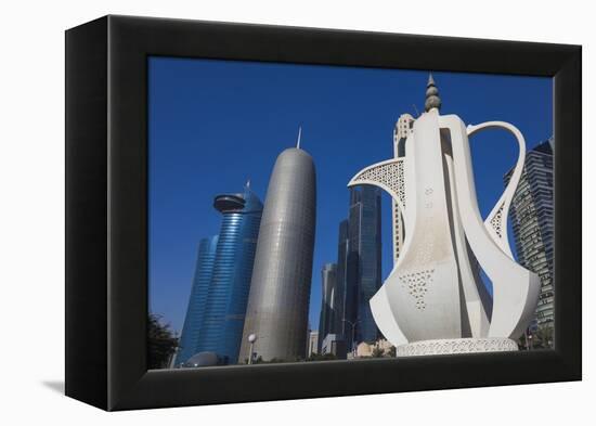 Qatar, Doha, Doha Bay, West Bay Skyscrapers, Morning, with Large Coffeepot Sculpture-Walter Bibikow-Framed Premier Image Canvas