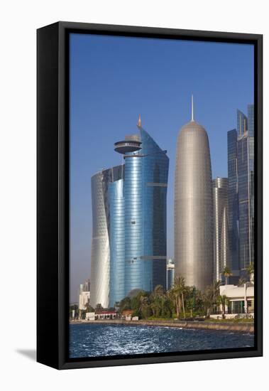 Qatar, Doha, Doha Bay, West Bay Skyscrapers with World Trade Center and Burj Qatar-Walter Bibikow-Framed Premier Image Canvas