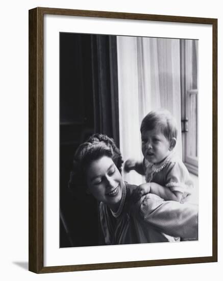 Queen Elizabeth and Prince Charles at Buckingham Palace, London, England-Cecil Beaton-Framed Photographic Print