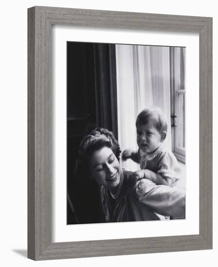 Queen Elizabeth and Prince Charles at Buckingham Palace, London, England-Cecil Beaton-Framed Photographic Print