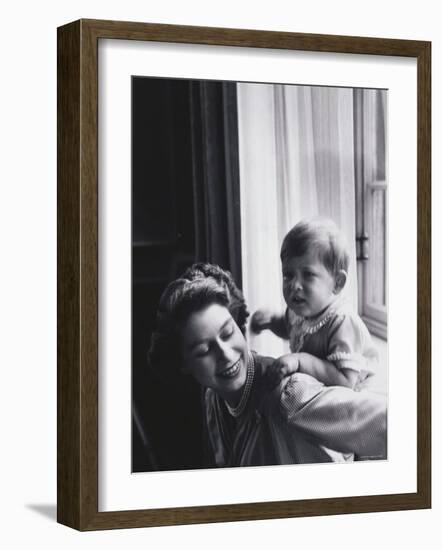 Queen Elizabeth and Prince Charles at Buckingham Palace, London, England-Cecil Beaton-Framed Photographic Print