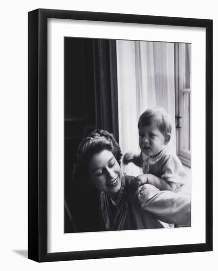 Queen Elizabeth and Prince Charles at Buckingham Palace, London, England-Cecil Beaton-Framed Photographic Print