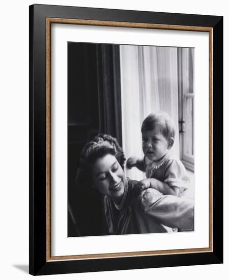 Queen Elizabeth and Prince Charles at Buckingham Palace, London, England-Cecil Beaton-Framed Photographic Print