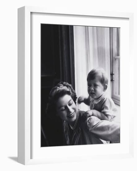 Queen Elizabeth and Prince Charles at Buckingham Palace, London, England-Cecil Beaton-Framed Photographic Print