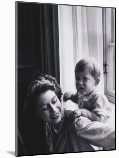 Queen Elizabeth and Prince Charles at Buckingham Palace, London, England-Cecil Beaton-Mounted Photographic Print