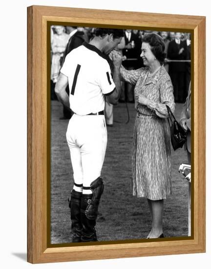 Queen Elizabeth II and Prince Charles, July 1985-null-Framed Premier Image Canvas