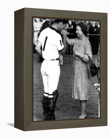 Queen Elizabeth II and Prince Charles, July 1985-null-Framed Premier Image Canvas