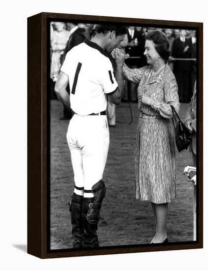 Queen Elizabeth II and Prince Charles, July 1985-null-Framed Premier Image Canvas