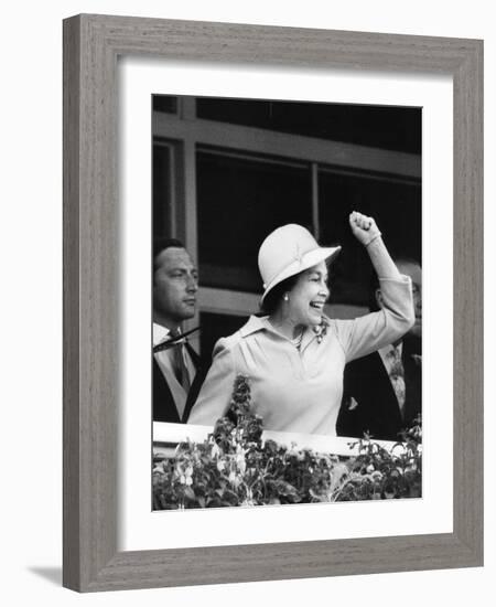 Queen Elizabeth II cheering on her horse at the Derby-Associated Newspapers-Framed Photo