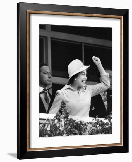 Queen Elizabeth II cheering on her horse at the Derby-Associated Newspapers-Framed Photo