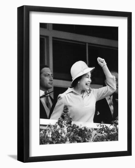 Queen Elizabeth II cheering on her horse at the Derby-Associated Newspapers-Framed Photo