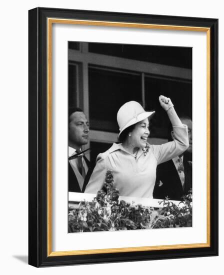 Queen Elizabeth II cheering on her horse at the Derby-Associated Newspapers-Framed Photo