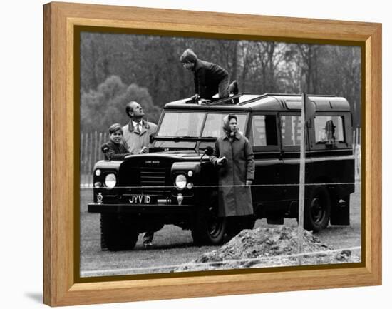 Queen Elizabeth II Looks on as Prince Edward Plays on the Roof of Their Land Rover-null-Framed Premier Image Canvas