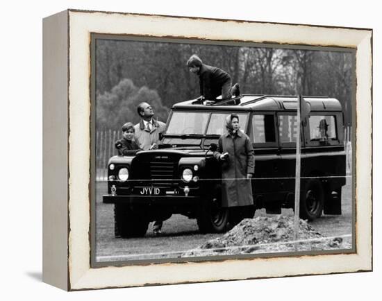 Queen Elizabeth II Looks on as Prince Edward Plays on the Roof of Their Land Rover-null-Framed Premier Image Canvas