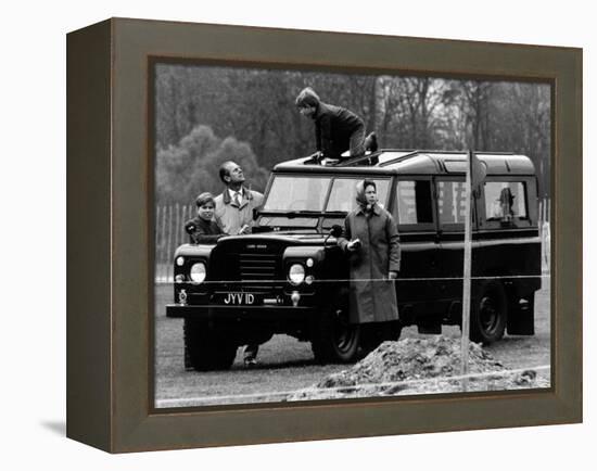 Queen Elizabeth II Looks on as Prince Edward Plays on the Roof of Their Land Rover-null-Framed Premier Image Canvas