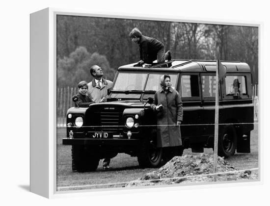 Queen Elizabeth II Looks on as Prince Edward Plays on the Roof of Their Land Rover-null-Framed Premier Image Canvas