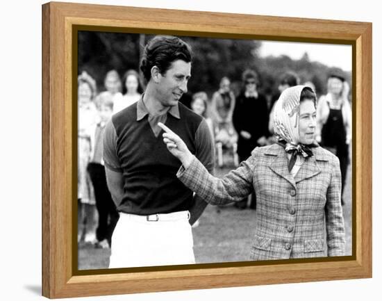 Queen Elizabeth II Shows Prince Charles Sign at a Polo Match at Windsor Great Park Points Finger-null-Framed Premier Image Canvas