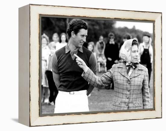 Queen Elizabeth II Shows Prince Charles Sign at a Polo Match at Windsor Great Park Points Finger-null-Framed Premier Image Canvas