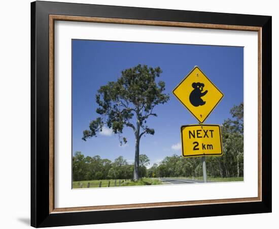 Queensland, Fraser Coast, Maryborough, Koala Crossing Sign on the Bruce Highway, Australia-Walter Bibikow-Framed Photographic Print