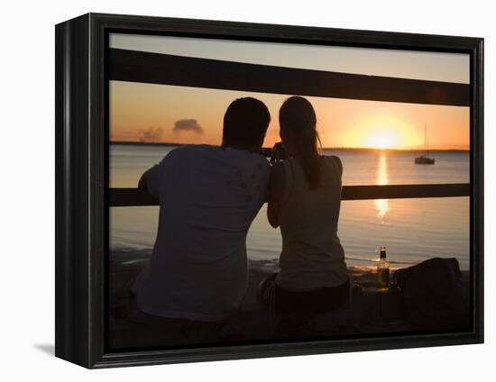 Queensland, Fraser Island, A Couple with Video Camera in Hand Watch Sunset from a Pier, Australia-Andrew Watson-Framed Premier Image Canvas