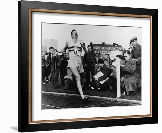 R. Bannister Runs Mile-null-Framed Photographic Print