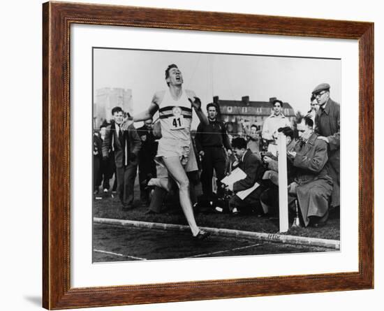 R. Bannister Runs Mile-null-Framed Photographic Print