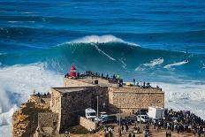 Surfer Riding Huge Wave in Nazare, Portugal, Famously known for Having the Biggest Waves in the Wor-R M Nunes-Photographic Print