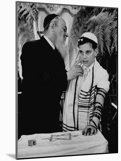 Rabbi David S. Novoseller Adjusting Carl Jay Bodek's Robe During Ceremony-Lisa Larsen-Mounted Photographic Print