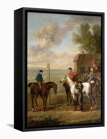 Racehorses with Jockeys Up by the Rubbing Down House on Newmarket Heath-John Wootton-Framed Premier Image Canvas