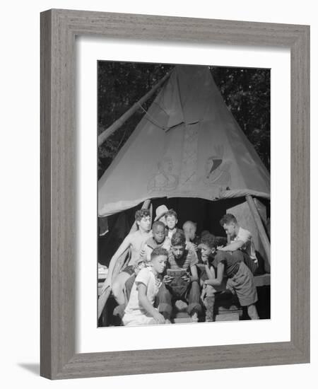 Racially Integrated Group of Boys Sharing a Comic Book at Camp Nathan Hale in Southfields, NY-Gordon Parks-Framed Photo