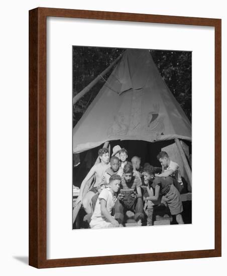 Racially Integrated Group of Boys Sharing a Comic Book at Camp Nathan Hale in Southfields, NY-Gordon Parks-Framed Photo