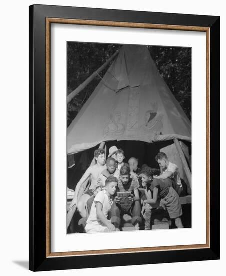 Racially Integrated Group of Boys Sharing a Comic Book at Camp Nathan Hale in Southfields, NY-Gordon Parks-Framed Photo