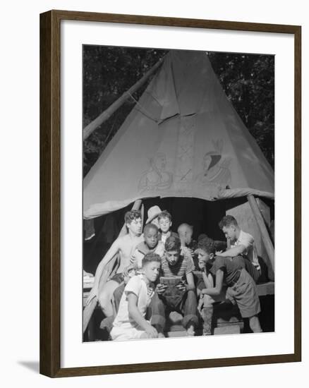 Racially Integrated Group of Boys Sharing a Comic Book at Camp Nathan Hale in Southfields, NY-Gordon Parks-Framed Photo