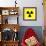 Radiation Warning Sign-Science Photo Library-Framed Premium Photographic Print displayed on a wall